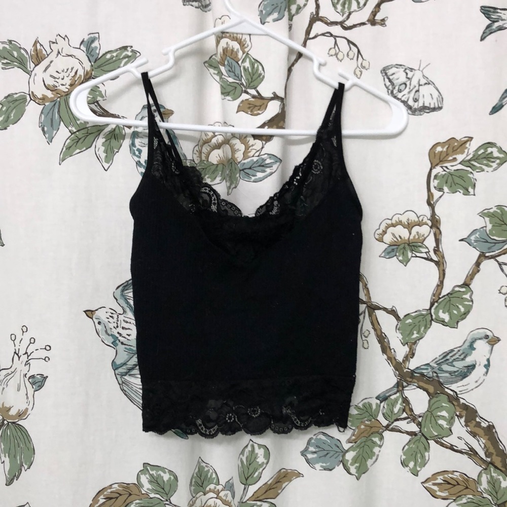Barley worn, black shirt with lace trim, size small but can fit medium, stretchy
